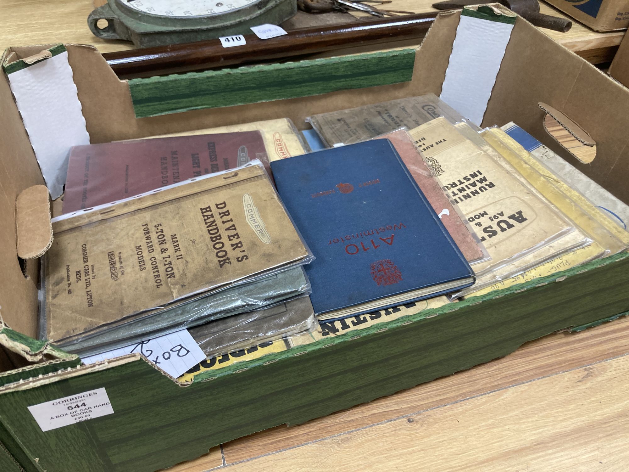 A box of car hand books